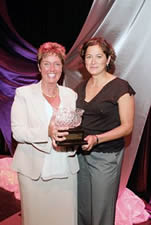 Rhonda Kelley and Jenna Boon receiving award for Joggins Fossil Institute