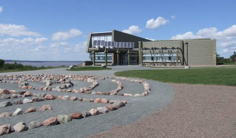 Joggins Fossil Centre from the labyrinth with the Bay of Fundy beyond