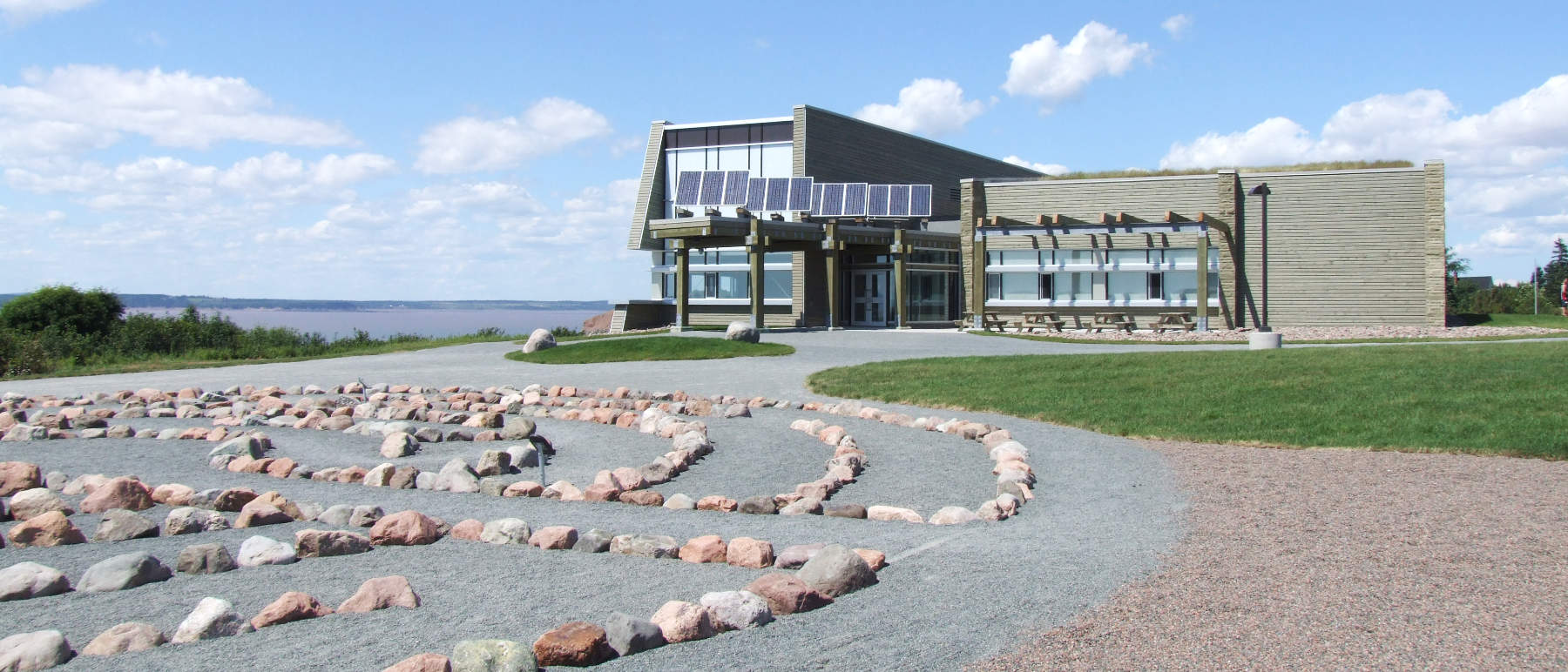 Joggins Fossil Centre from the labyrinth with the Bay of Fundy beyond